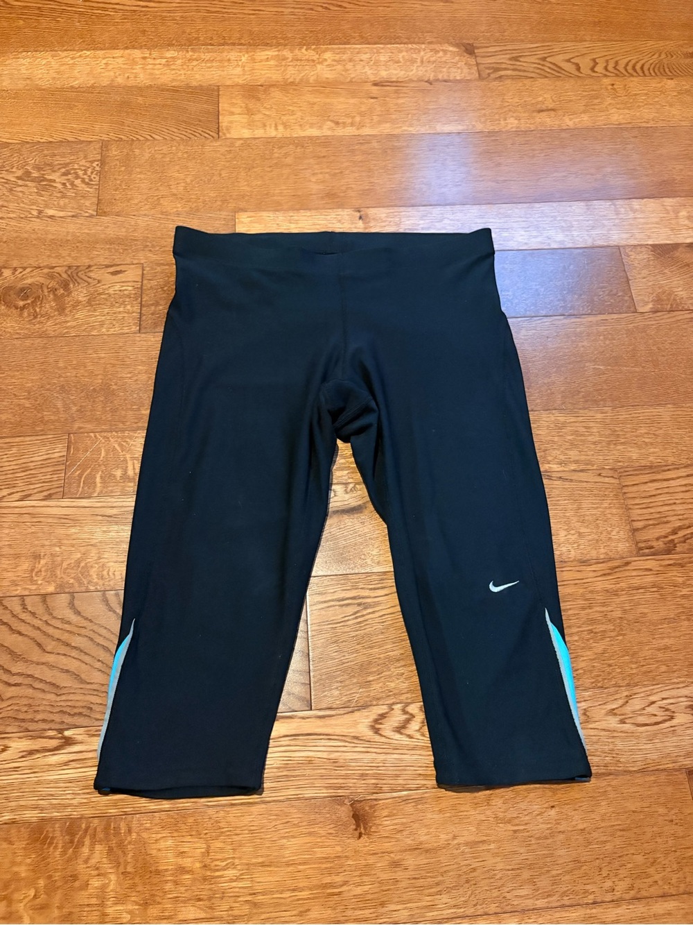 Nike Black Capri Leggings with Blue Side Panels